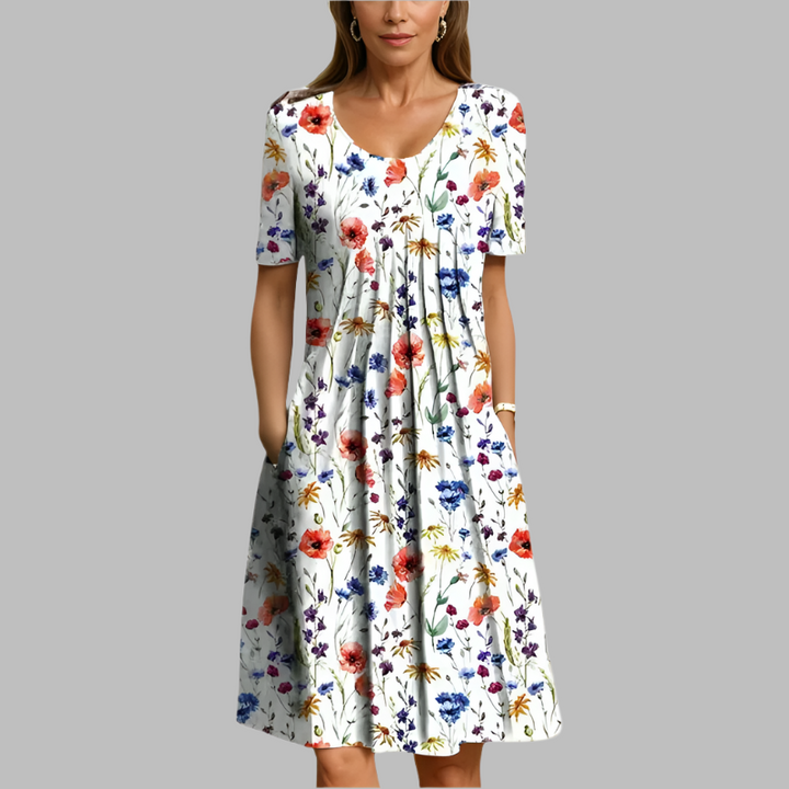 Marielle – Letní šaty s květinovým vzorem a kapsami