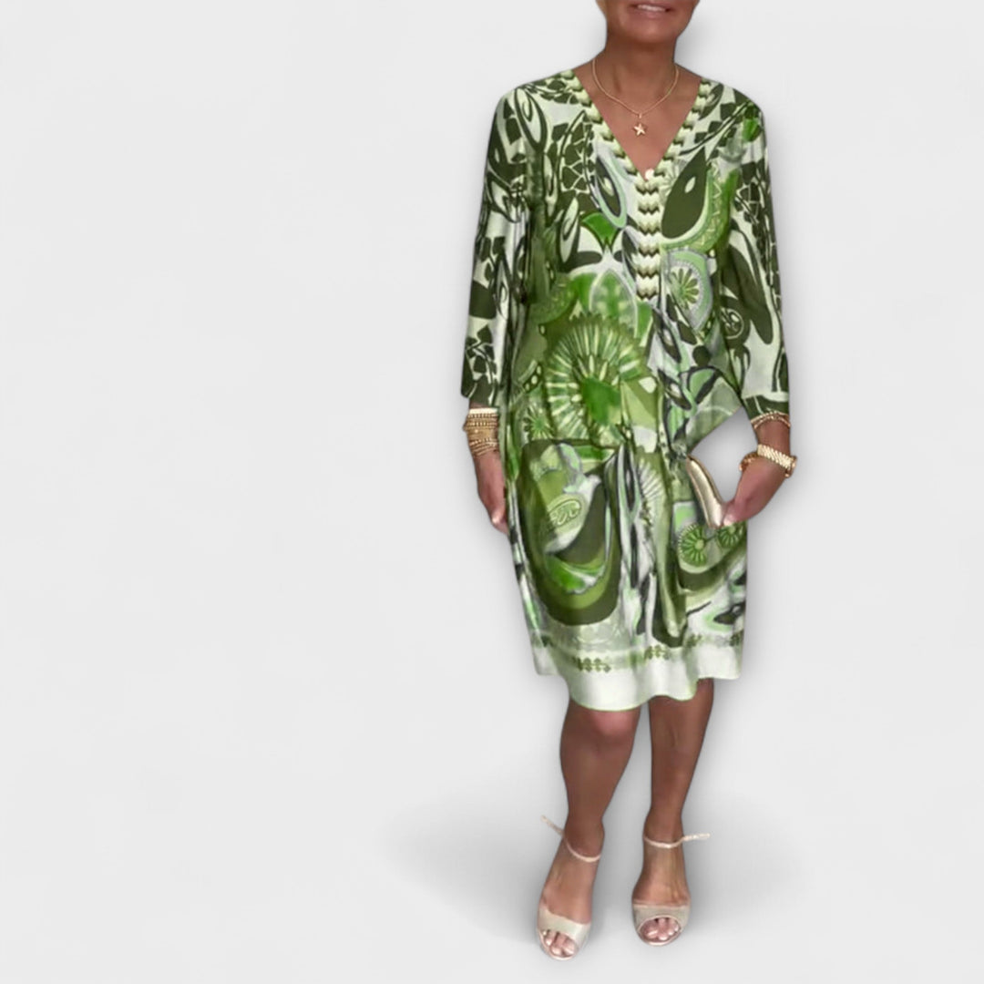 V-hals uvolněné šaty s retro potiskem