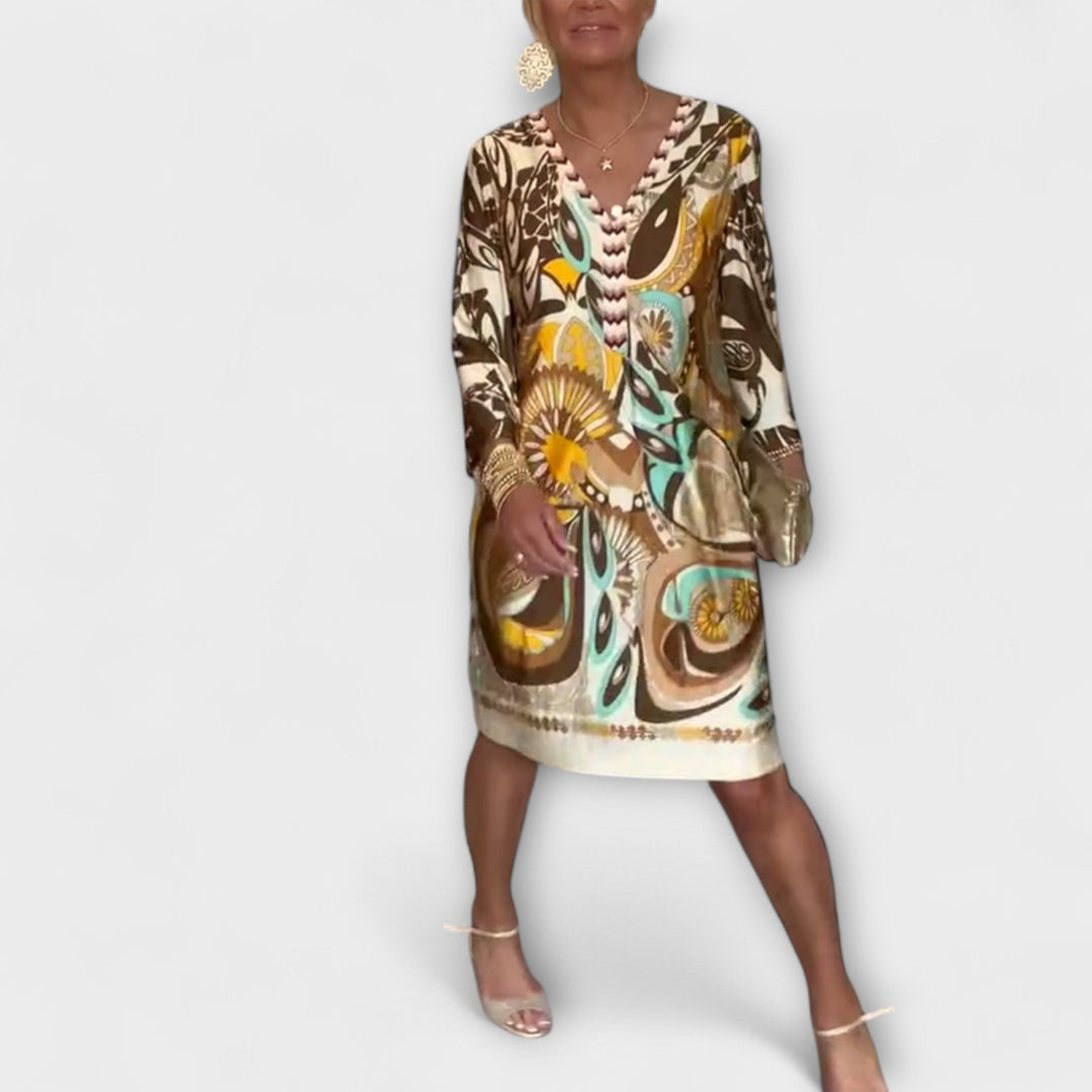 V-hals uvolněné šaty s retro potiskem